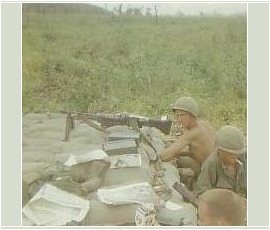 A Wolfhound mans the M60 at a fighting position. On the M60
