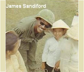 James Sandiford with Vietnamese children. James Sandiford with villagers